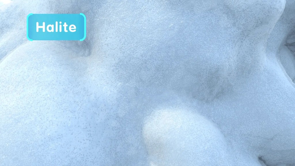 A close-up image of a halite deposit, a mineral composed of sodium chloride, used as table salt and a deicer.